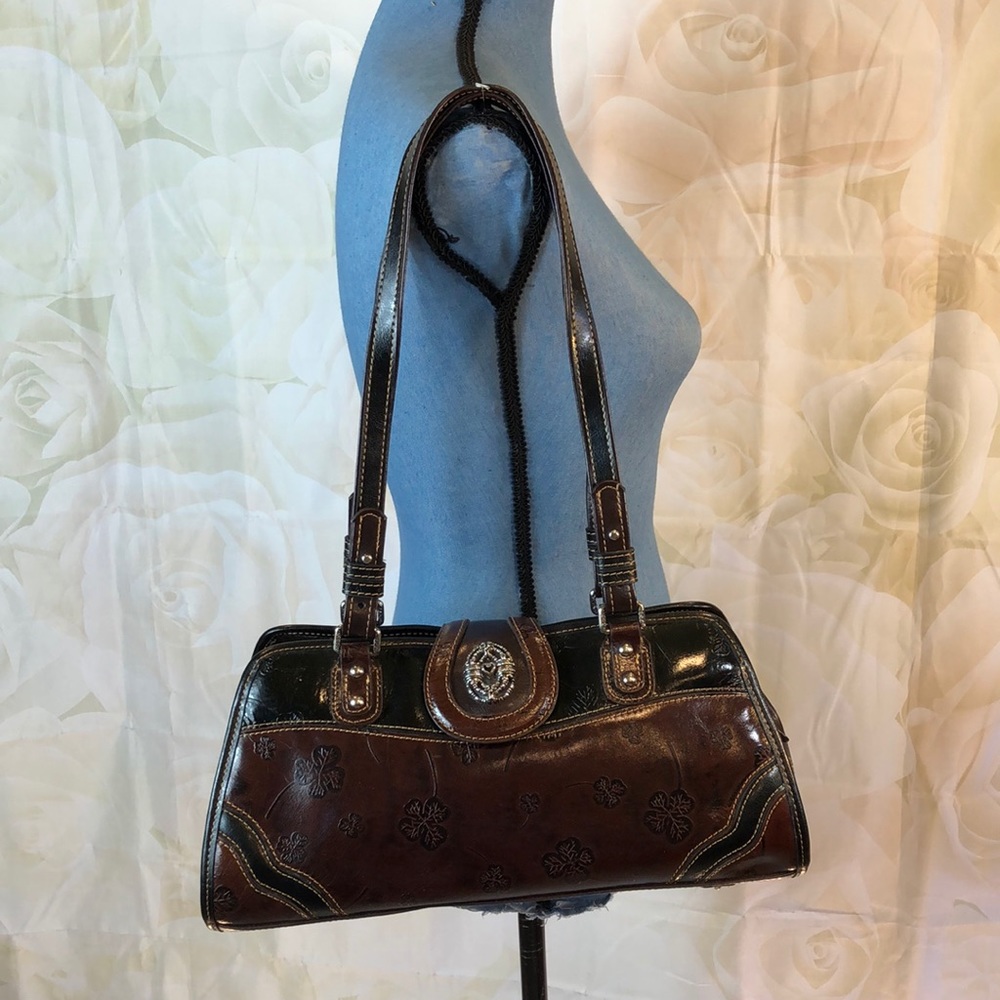M.C. embossed vegan leather purse
